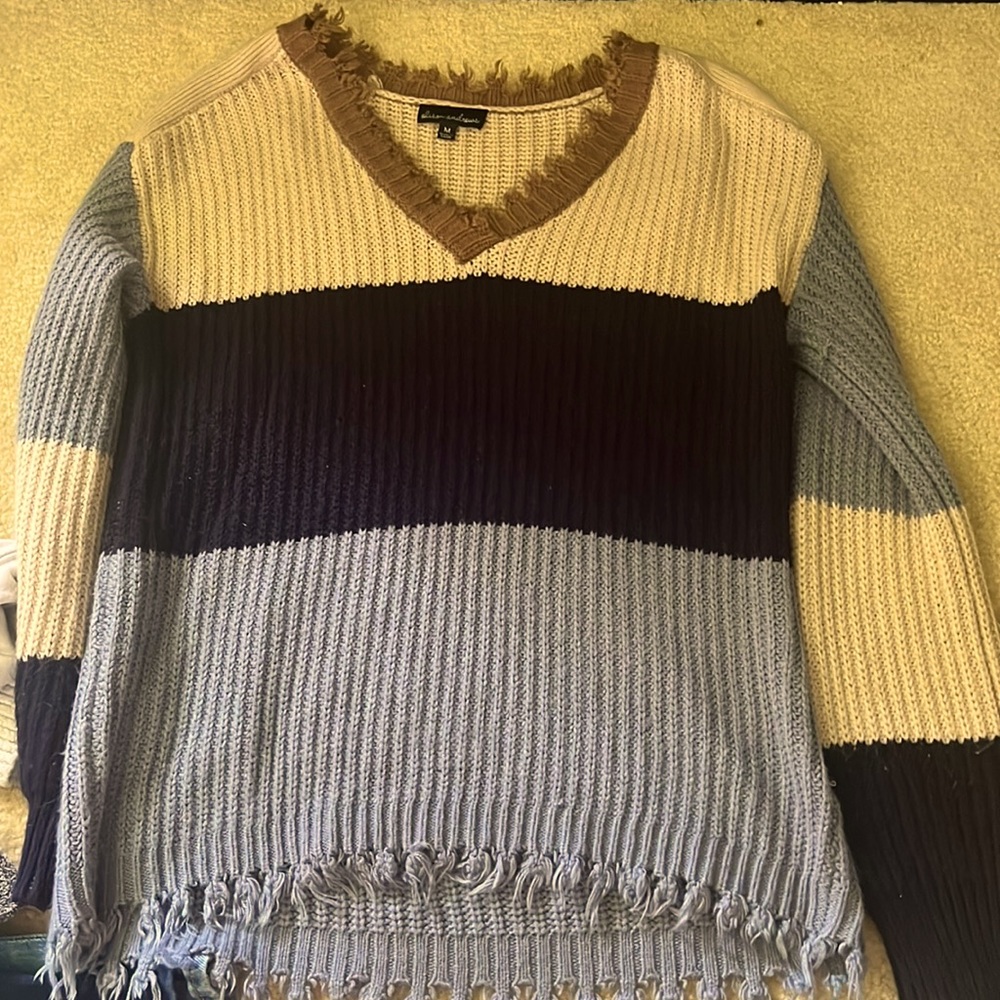 this is Alison Andrews, it’s V neck and very soft